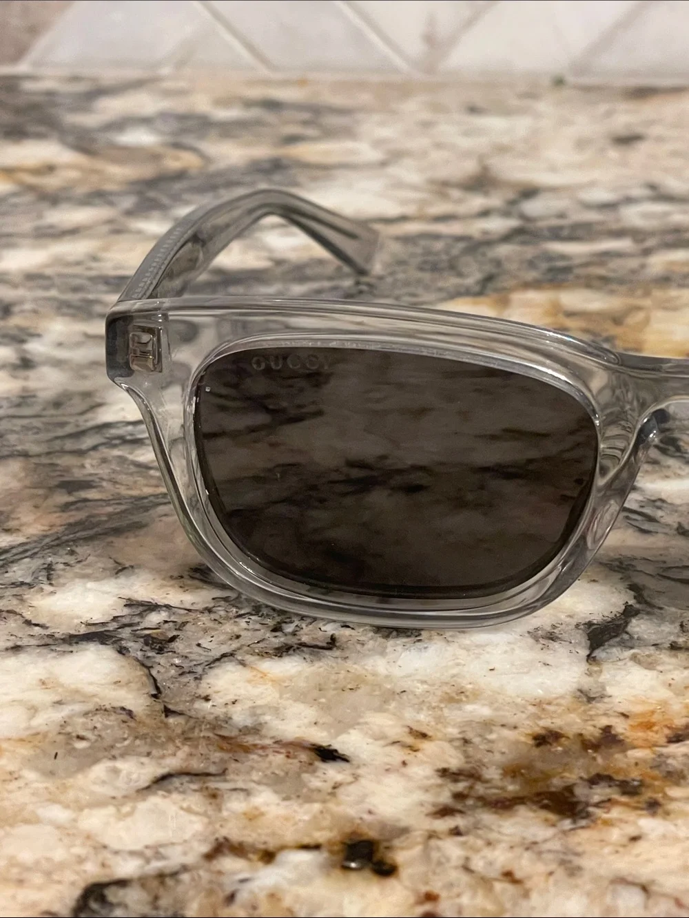Gucci Clear Frame Sunglasses with Gray Lenses